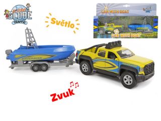 Obrázek z Tahač s lodí kov 27cm zpětný chod na baterie, světlo, zvuk 